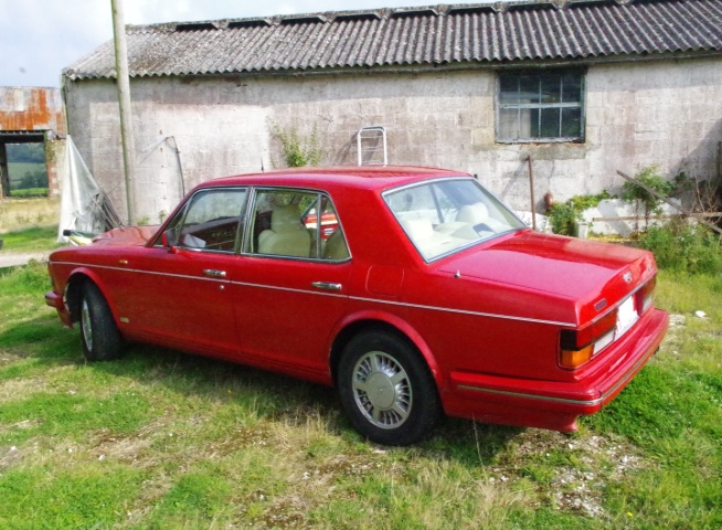 Vermillion Bentley Turbo R 1989 model year  15,600 Recorded miles ONLY. Believed to be genuine judging by engine compression statistics Rumoured to be originally  Owned  by Malaysian Royal Family. Runs well but needs work on body for MOT. To be recommissioned over autumn 2016.  Interior beige and many extra inlay wood panels.  Another fabulous gentlemans hot rod with added bling
