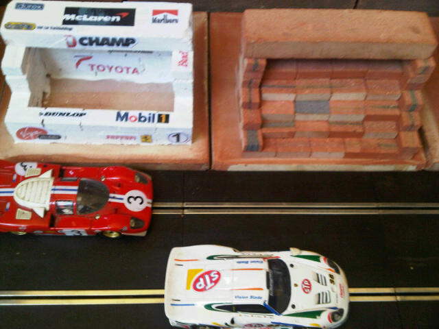 Scalextric Pits, Control Building, Restaurant, Grandstand. Similar to original range of plastic Scalextric Goodwood race buildings but in clay - built from mini bricks, painted (or not) and decals added.