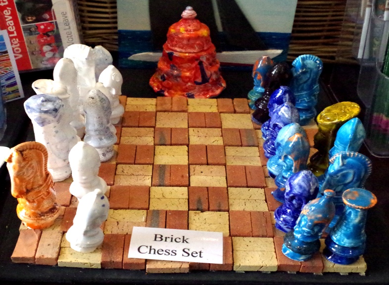 Glazed Chess pieces slip cast pottery by BB Bango. 