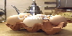 Clay Cookware made in a  Nottinghamshire pottery. Terracotta clay is a porous material which, when soaked in water and then heated in the oven, provides a slow evaporation of steam from the pores, creating a steamy enclosed environment - Perfect for achieving succulent, tender and full-flavoured roasts. Also terracotta Egg Racks, Garlic pots, Graters and Wine Stackers as well as Pizza Bakers.