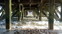 'Under Sandown pier 3'.  Postcard based on original Bango Photograph. 