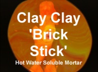The ClayClay 'BrickStick' Mortar, 10g. Dissolve building in hot water. Bricks can be used again