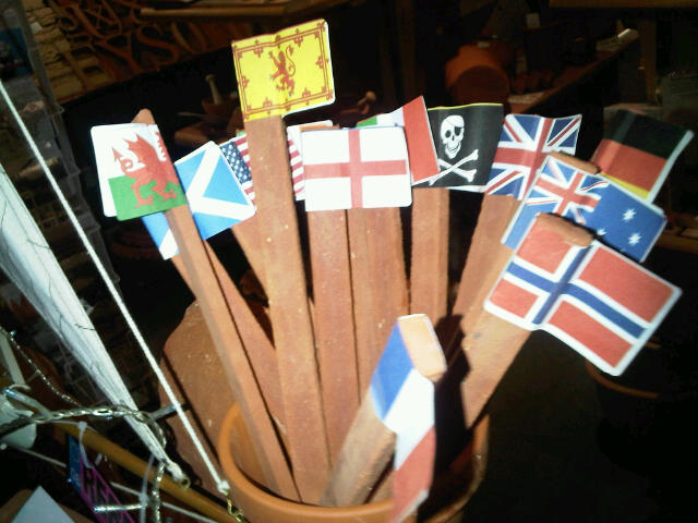 Beach Flags. Set of terracotta flagpoles 