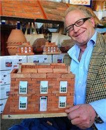 Tim Bristow, of Clay Clay, with a miniature clay brick building of a Georgian mansion. Picture by Peter Boam. Isle of Wight County Press Article 29th April 2011