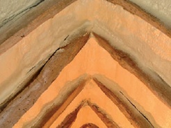 Modern interlocking concrete tiles spoil the appearance of a small lodge (top), while the �turnerised� coating of hessian and bitumen (centre) not only looks awful but traps moisture and invites frost damage. A recent development, spray-on foam (above), may secure the tiles, but this too traps moisture and is extremely difficult to remove, making it unlikely that any of the original tiles on this roof will ever be reused